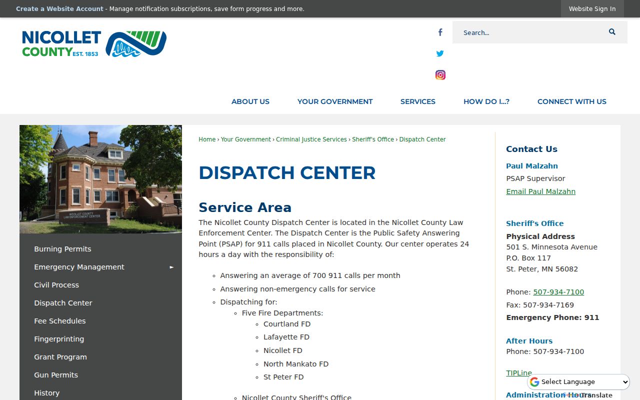 Nicollet County dispatch center page showing the non-emergency route for warrant questions